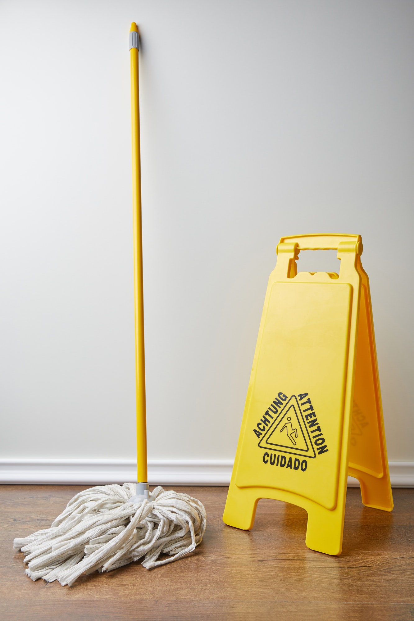 wet floor sign and mop for spring cleaning